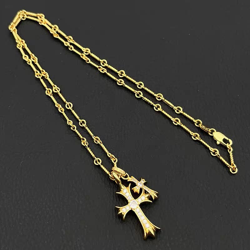 Chrome Hearts Gold Cross Pendant with Gemstones